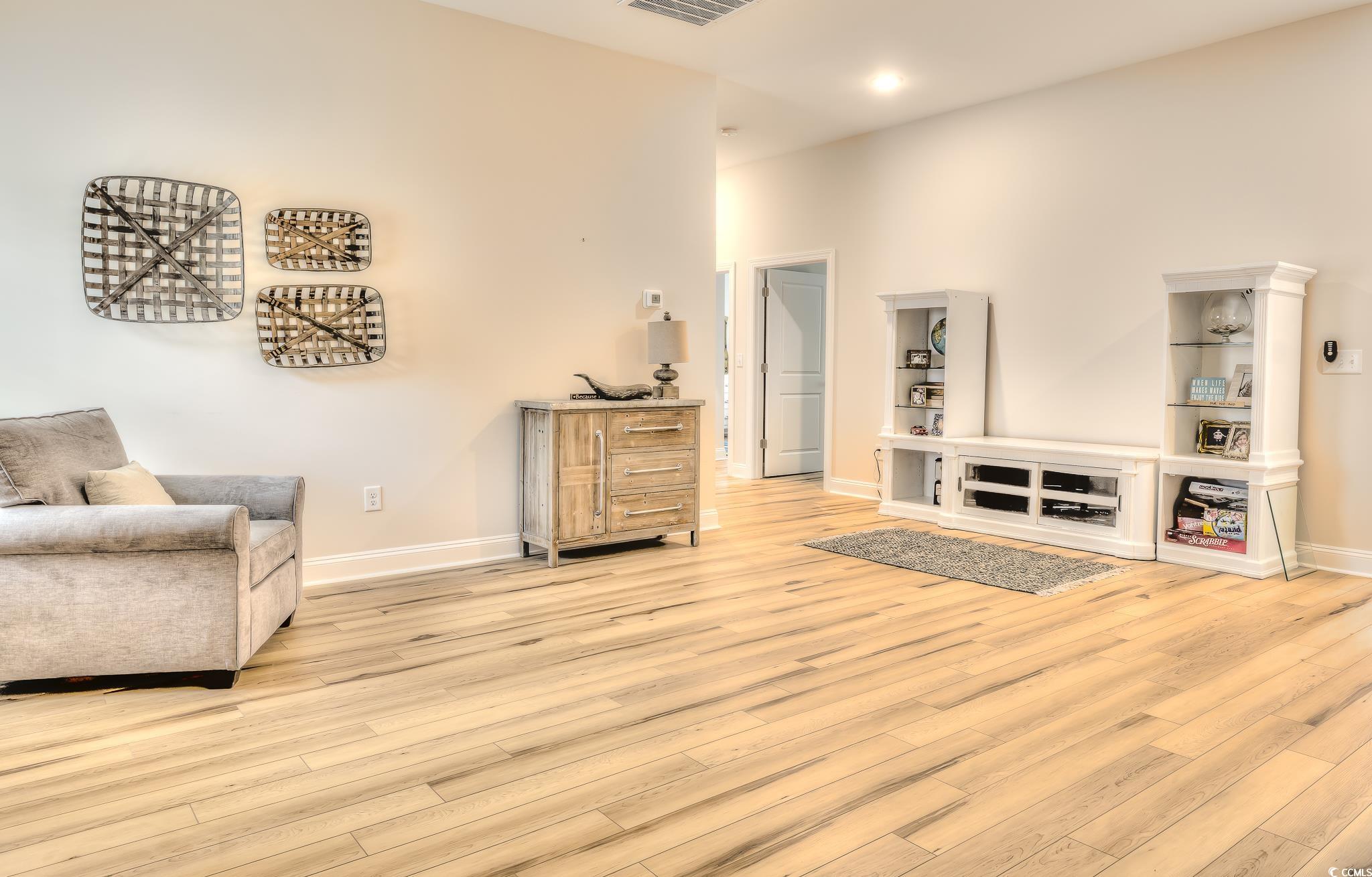 10 Saltwater Way Murrells Inlet, SC 29576 - Photo 17 of 30 Living room featuring light wood-type flooring and