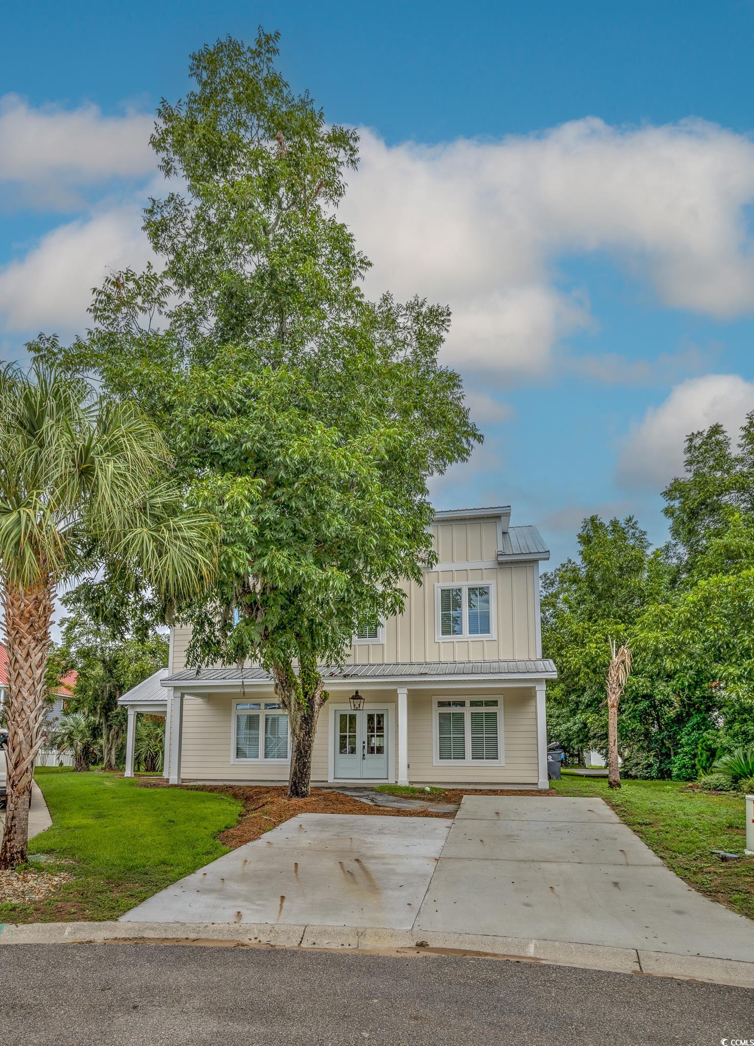 10 Saltwater Way Murrells Inlet, SC 29576 - Photo 2 of 30 View of front facade featuring a front yard