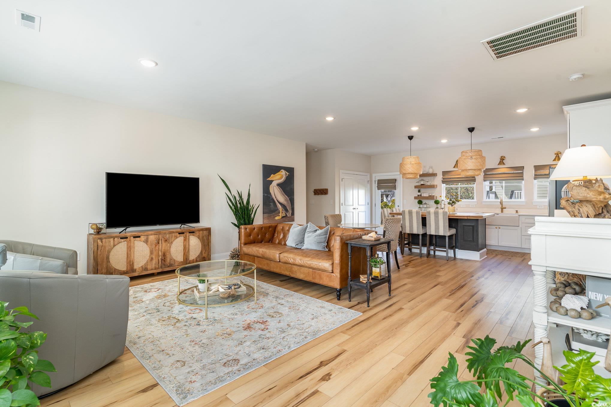 10 Saltwater Way Murrells Inlet, SC 29576 - Photo 5 of 30 Living room featuring light hardwood / wood-style