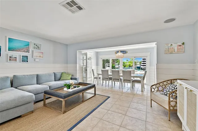 a balcony with wooden floor and lake view