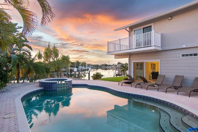 a house with a yard and garage