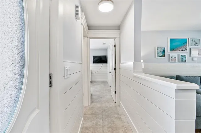 a kitchen with granite countertop a stove a sink and a microwave