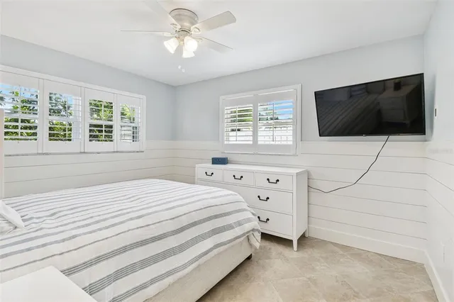 a view of a kitchen with white cabinets