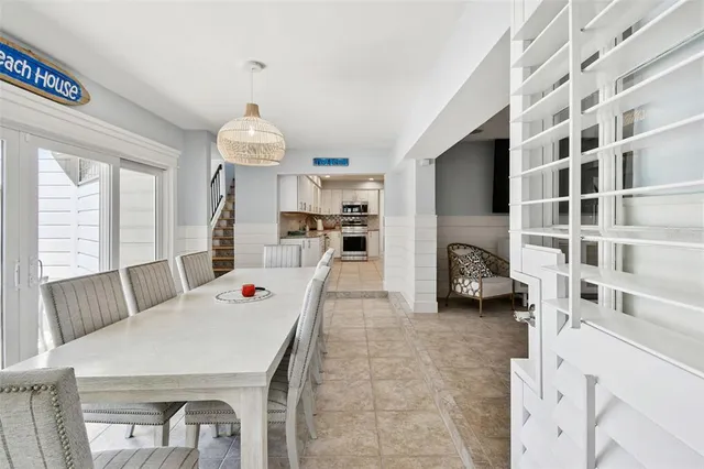 a living room with a couch and a rug