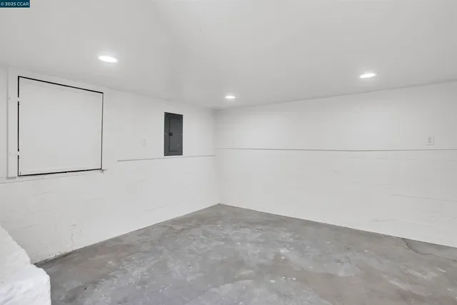 a view of a room with wooden walls