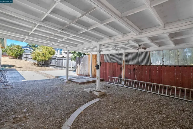 a front view of a house with trees