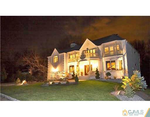 6 Ramsey Road Edison, NJ 08820 - Photo 1 of 25 a black and white photo of a house
