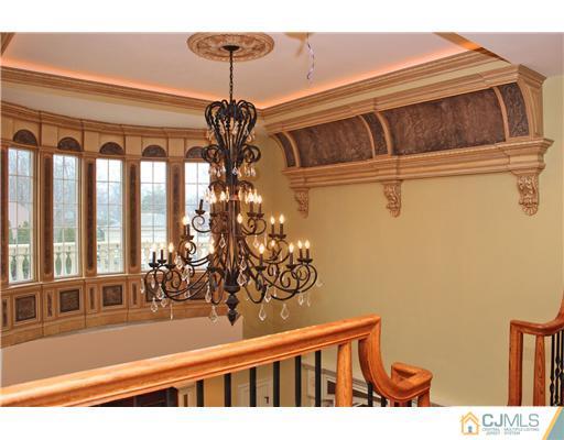 6 Ramsey Road Edison, NJ 08820 - Photo 16 of 25 a view of entryway and hall with wooden floor
