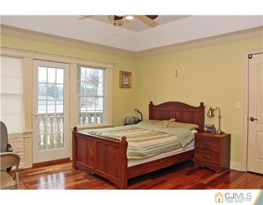 6 Ramsey Road Edison, NJ 08820 - Photo 24 of 25 a bedroom with a bed window and a table