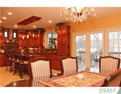 6 Ramsey Road Edison, NJ 08820 - Photo 4 of 25 a view of a living room and balcony