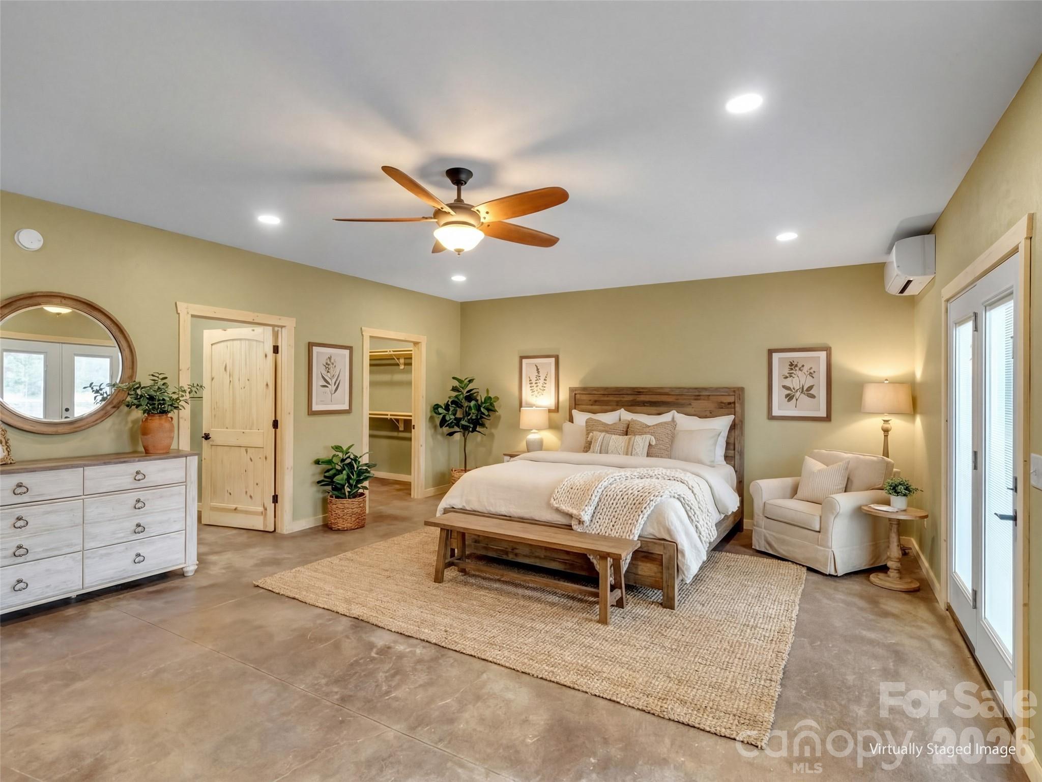 171 Cowtail Cove Clyde, NC 28721 - Photo 34 of 48 a spacious bedroom with a bed and dresser
