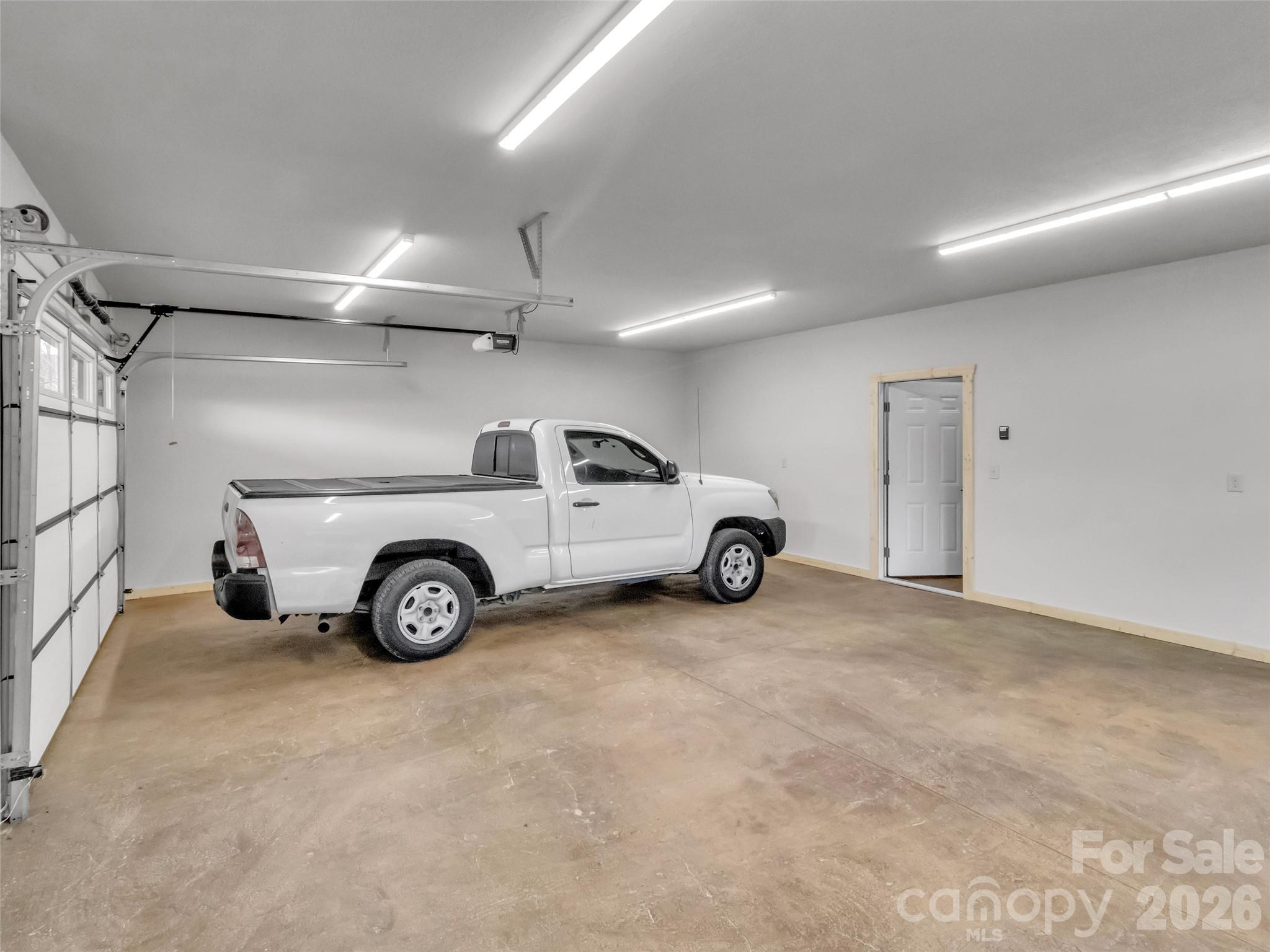 171 Cowtail Cove Clyde, NC 28721 - Photo 39 of 48 a view of a car in garage