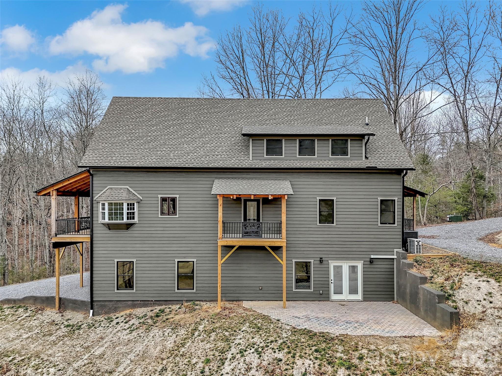 171 Cowtail Cove Clyde, NC 28721 - Photo 45 of 48 a front view of a house with garden
