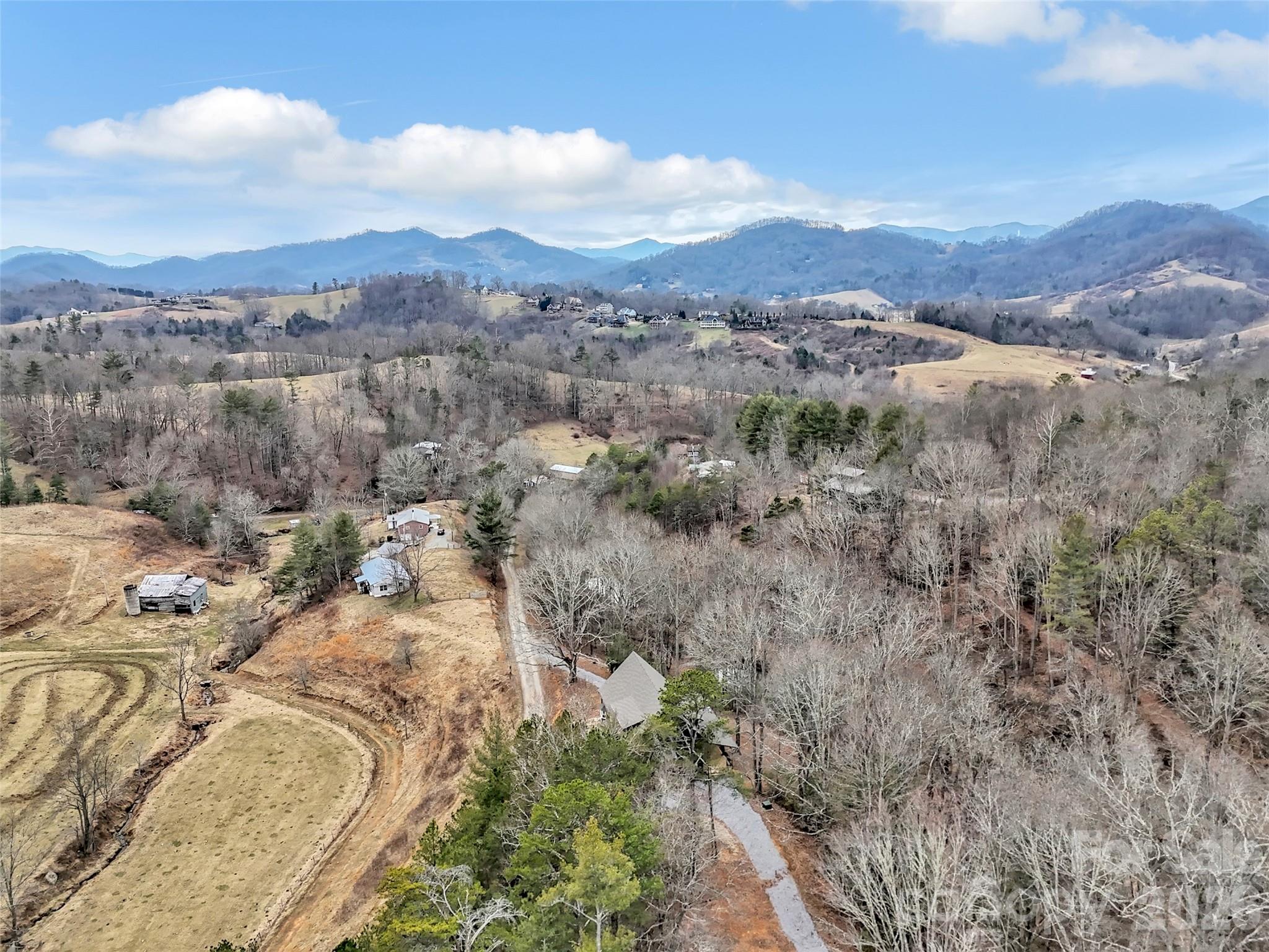 171 Cowtail Cove Clyde, NC 28721 - Photo 47 of 48 an aerial view of residential house and sandy dunes