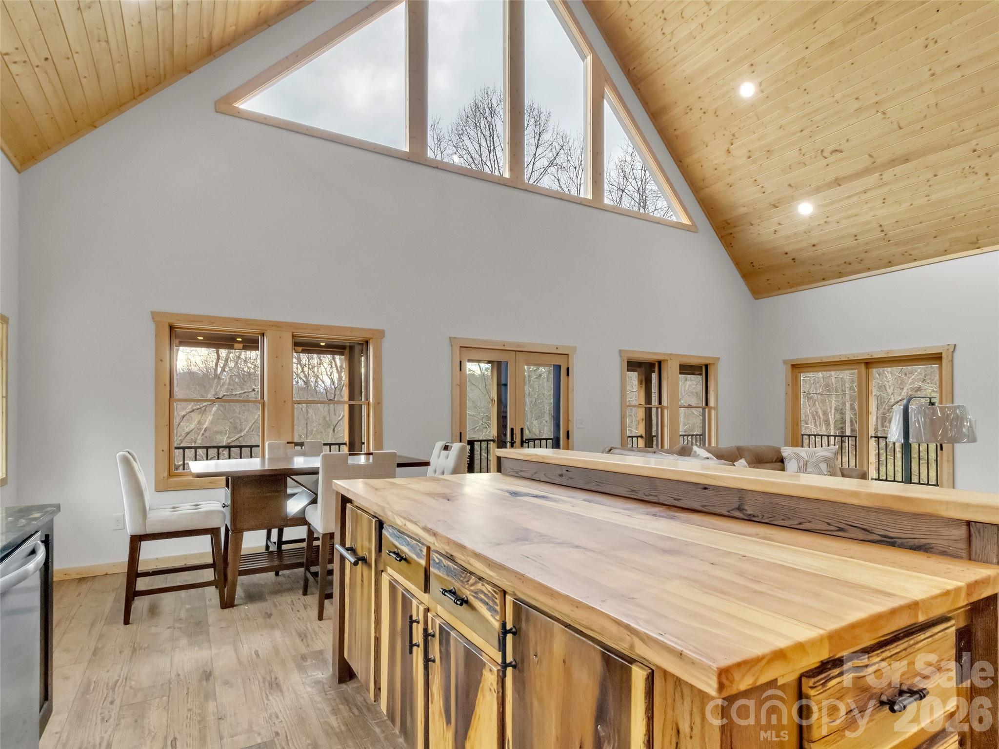 171 Cowtail Cove Clyde, NC 28721 - Photo 9 of 48 a living room with stainless steel appliances granite countertop furniture and a kitchen view