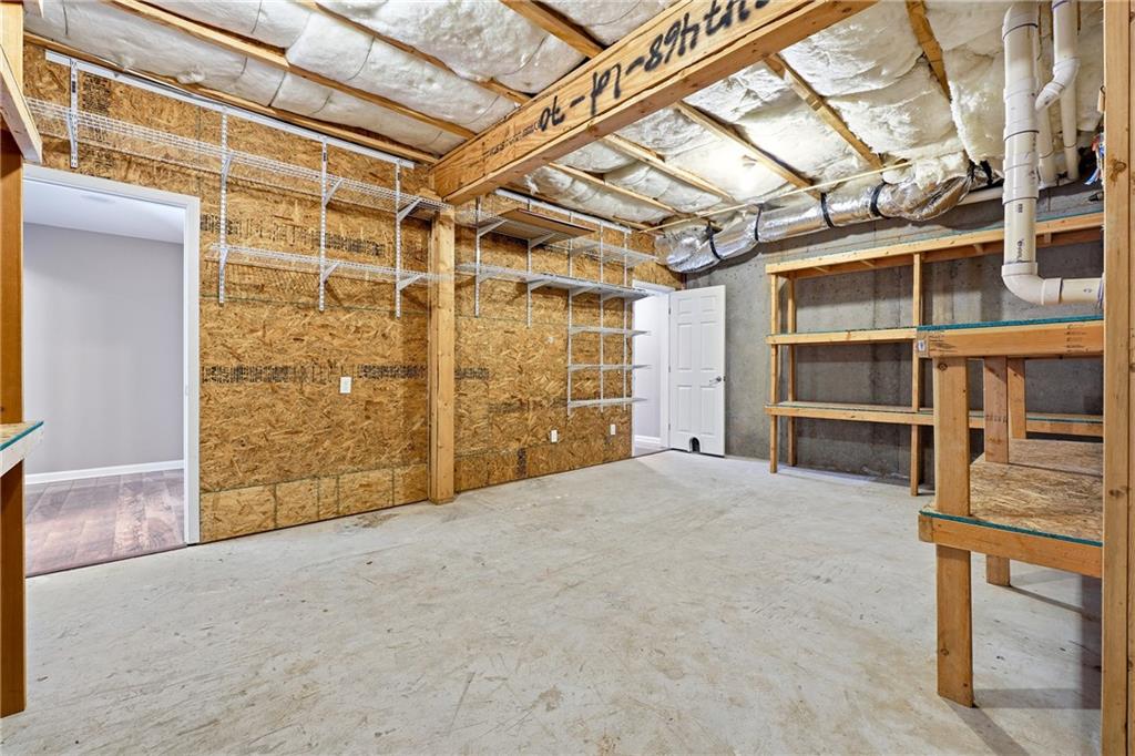 304 Meadowcrest Circle Canton, GA 30115 - Photo 34 of 50 a view of an empty room with a staircase