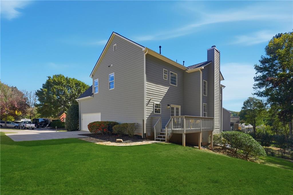 304 Meadowcrest Circle Canton, GA 30115 - Photo 38 of 50 a front view of house with yard and green space