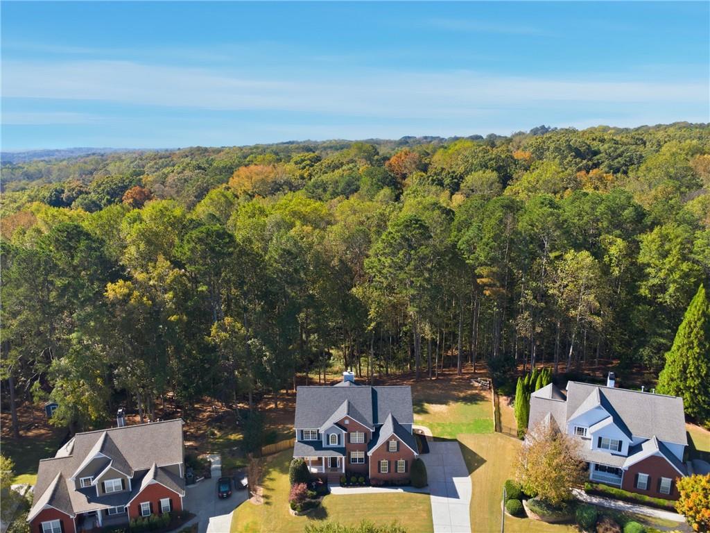 304 Meadowcrest Circle Canton, GA 30115 - Photo 40 of 50 an aerial view of a house with a yard and lake view