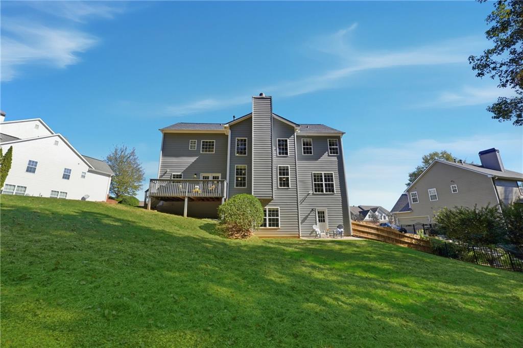 304 Meadowcrest Circle Canton, GA 30115 - Photo 4 of 50 a view of a house with backyard