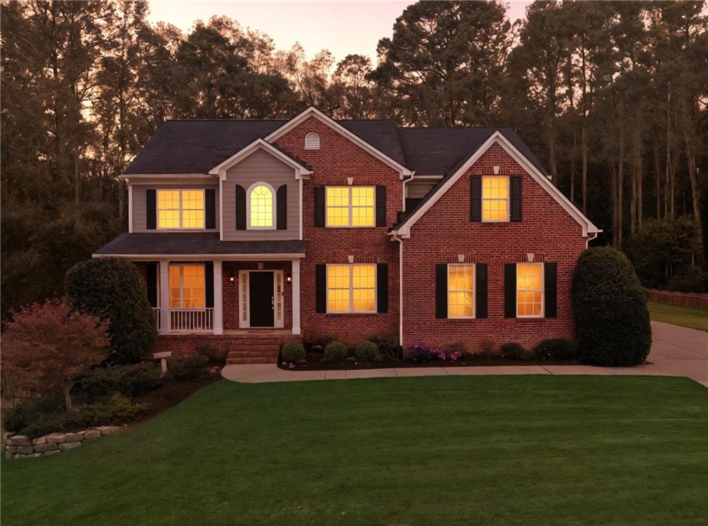 304 Meadowcrest Circle Canton, GA 30115 - Photo 43 of 50 a front view of a house with a yard