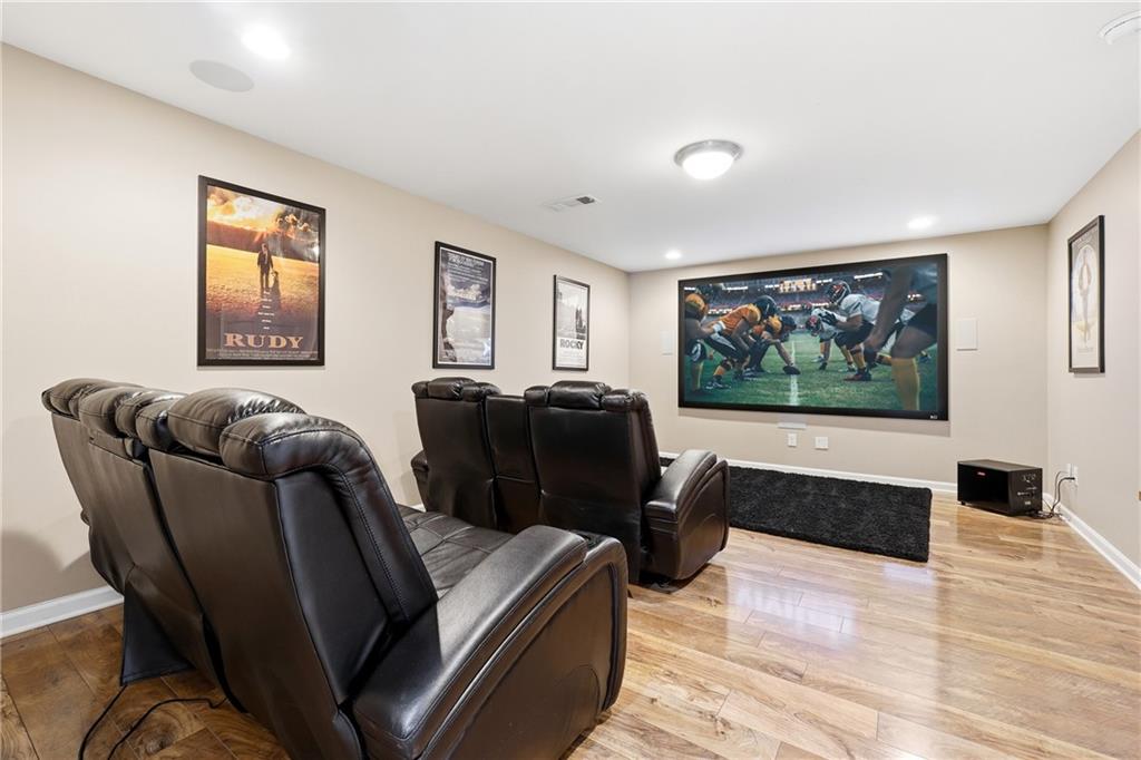 304 Meadowcrest Circle Canton, GA 30115 - Photo 5 of 50 a living room with furniture and a flat screen tv