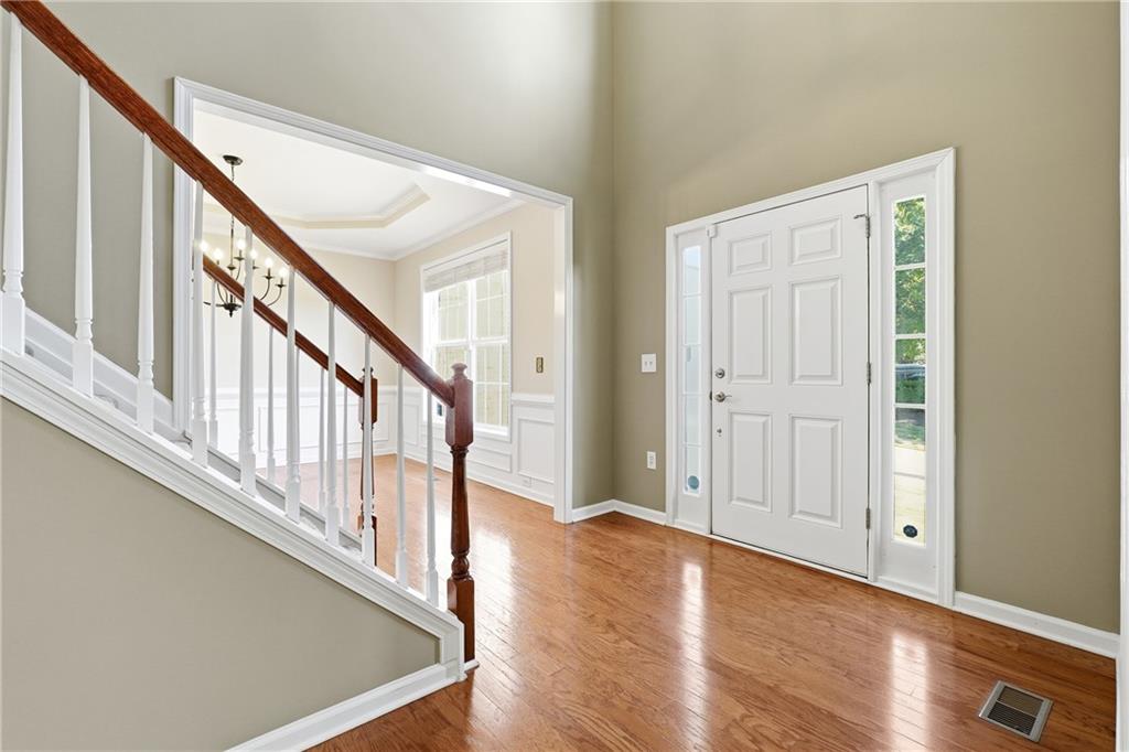 304 Meadowcrest Circle Canton, GA 30115 - Photo 6 of 50 a view of an entryway with wooden floor