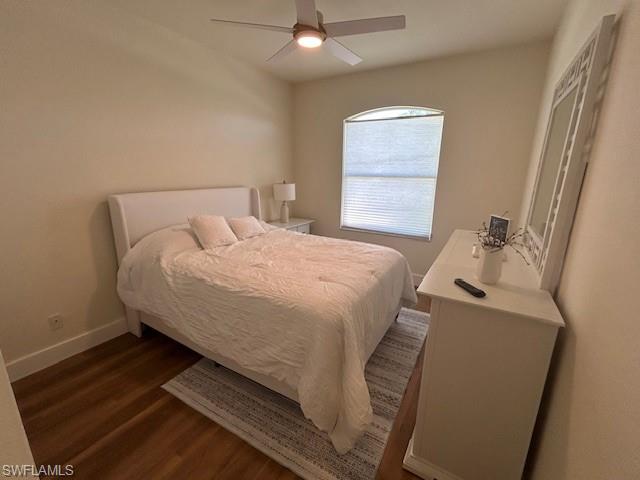 430 Crossfield Circle Naples, FL 34104 - Photo 19 of 24 a bedroom with a bed and a window