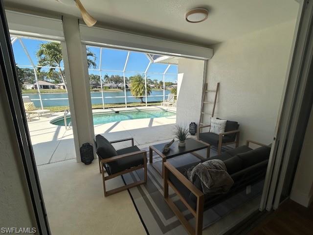 430 Crossfield Circle Naples, FL 34104 - Photo 22 of 24 a living room with furniture and a large window