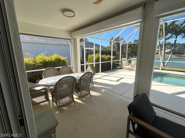 430 Crossfield Circle Naples, FL 34104 - Photo 23 of 24 a room with chairs and a window
