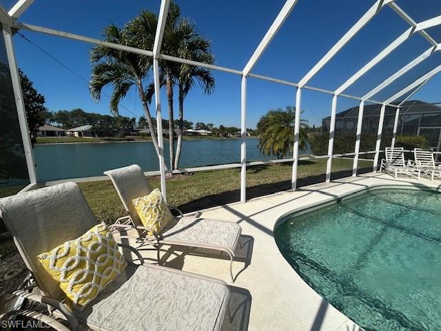 430 Crossfield Circle Naples, FL 34104 - Photo 24 of 24 a view of swimming pool with a patio and a yard