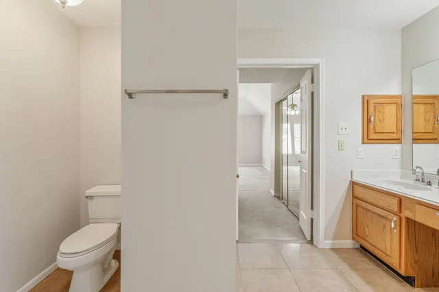 a view of a hallway with entryway door