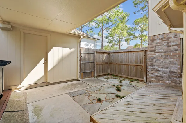 a view of a room with wooden walls