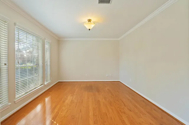 a view of a room with a large window