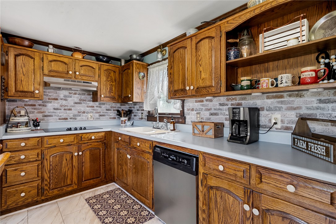 801 Princeton Highway Honea Path, SC 29654 - Photo 11 of 49 This spacious kitchen offers ample storage and a functional layout for daily living.