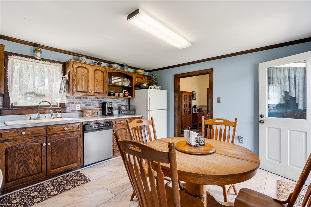 801 Princeton Highway Honea Path, SC 29654 - Photo 13 of 49 This bright kitchen offers functional design and a cozy breakfast nook for casual dining.