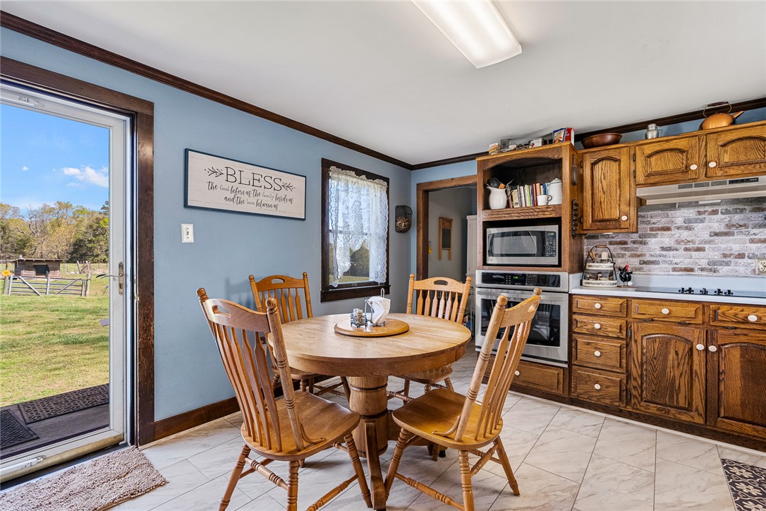 801 Princeton Highway Honea Path, SC 29654 - Photo 15 of 49 This cozy eat-in kitchen features ample cabinet space and modern appliances, perfect for everyday meals.