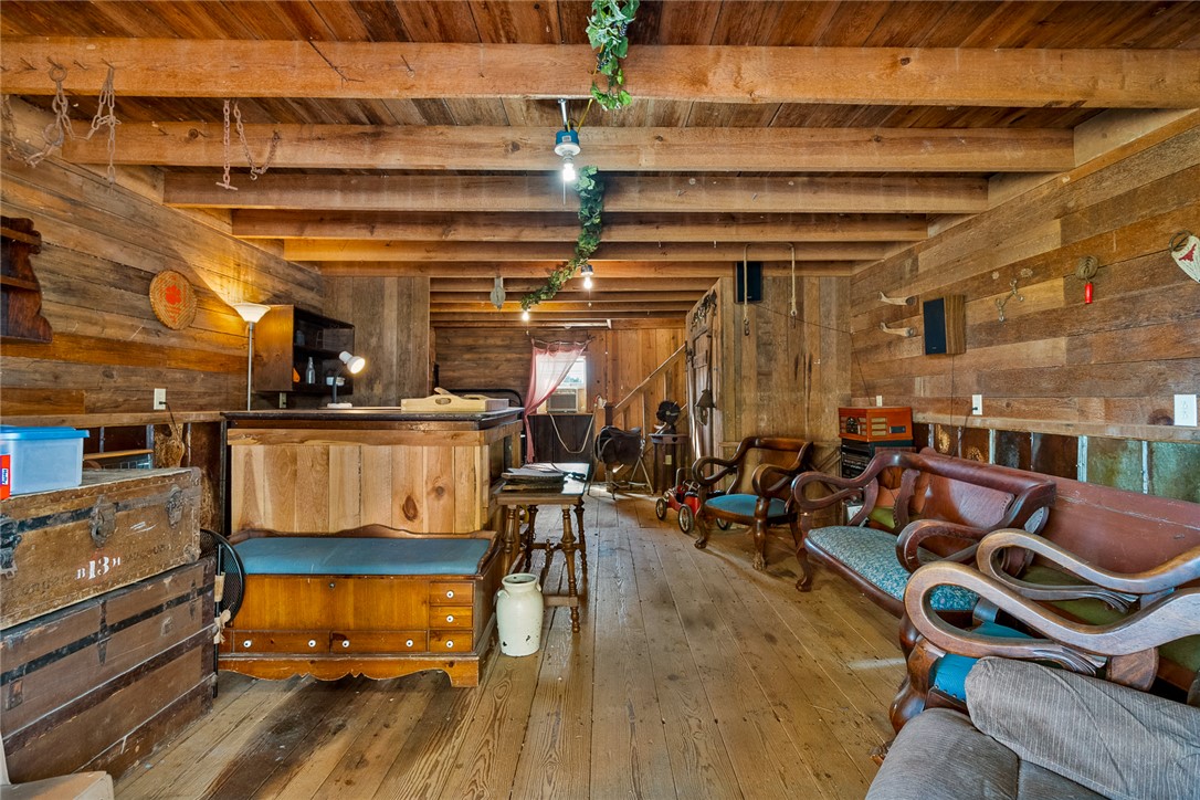 801 Princeton Highway Honea Path, SC 29654 - Photo 30 of 49 This inviting space features natural wood walls and ceiling, creating a warm and rustic atmosphere.