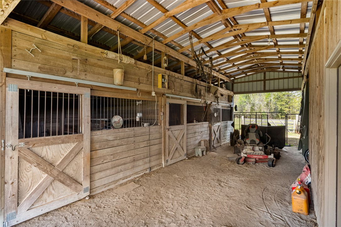 801 Princeton Highway Honea Path, SC 29654 - Photo 35 of 49 This spacious barn offers ample room and rustic charm, perfect for equestrian pursuits.