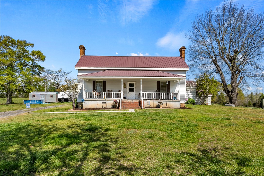 801 Princeton Highway Honea Path, SC 29654 - Photo 49 of 49 This charming home features a welcoming porch, perfect for enjoying peaceful outdoor moments.
