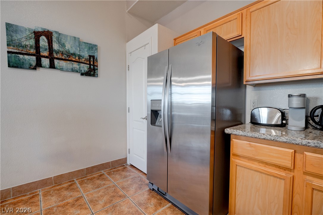 2305 West Horizon Ridge Parkway, Unit 224 Henderson, NV 89052 - Photo 16 of 41 This bright kitchen area features sleek stainless steel appliances and durable tile flooring.