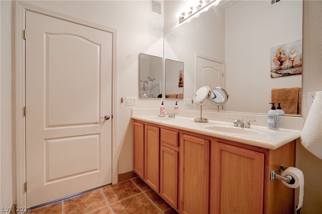 2305 West Horizon Ridge Parkway, Unit 224 Henderson, NV 89052 - Photo 22 of 41 This bright bathroom features a spacious vanity and tile flooring for a clean aesthetic.