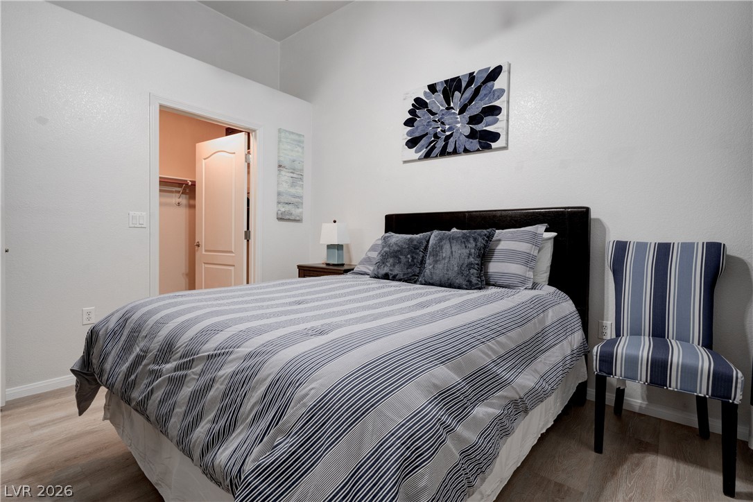 2305 West Horizon Ridge Parkway, Unit 224 Henderson, NV 89052 - Photo 23 of 41 This inviting bedroom offers comfort with a spacious closet and durable flooring.