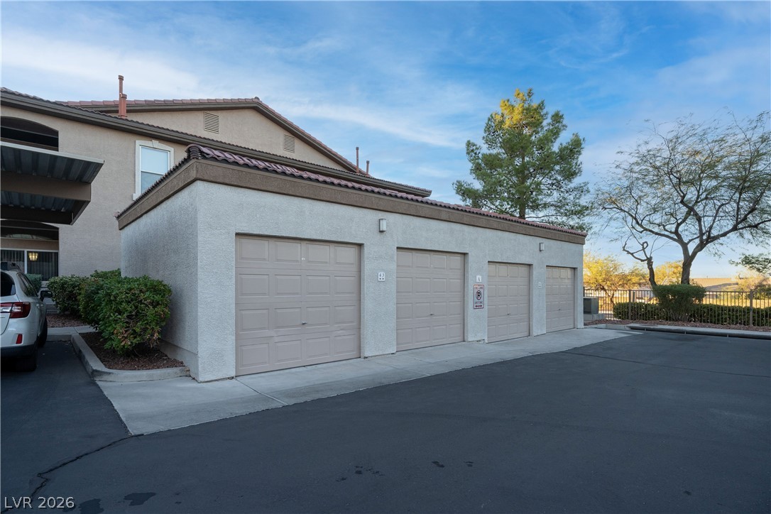 2305 West Horizon Ridge Parkway, Unit 224 Henderson, NV 89052 - Photo 30 of 41 Secure parking spaces provide convenience and peace of mind.