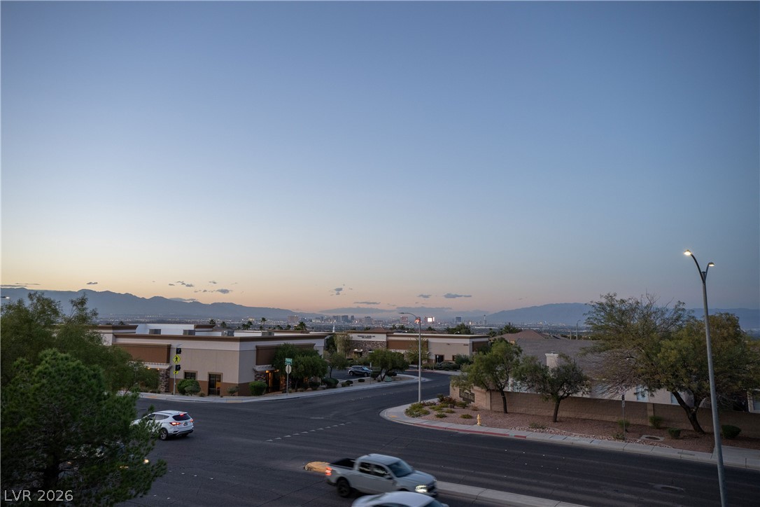 2305 West Horizon Ridge Parkway, Unit 224 Henderson, NV 89052 - Photo 3 of 41 This elevated view captures the dynamic city below with expansive mountain vistas.