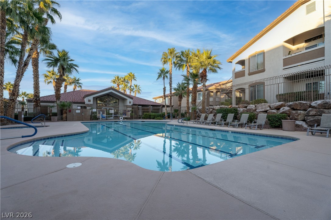 2305 West Horizon Ridge Parkway, Unit 224 Henderson, NV 89052 - Photo 41 of 41 Relax and unwind by the community pool, surrounded by lush landscaping and scenic views.