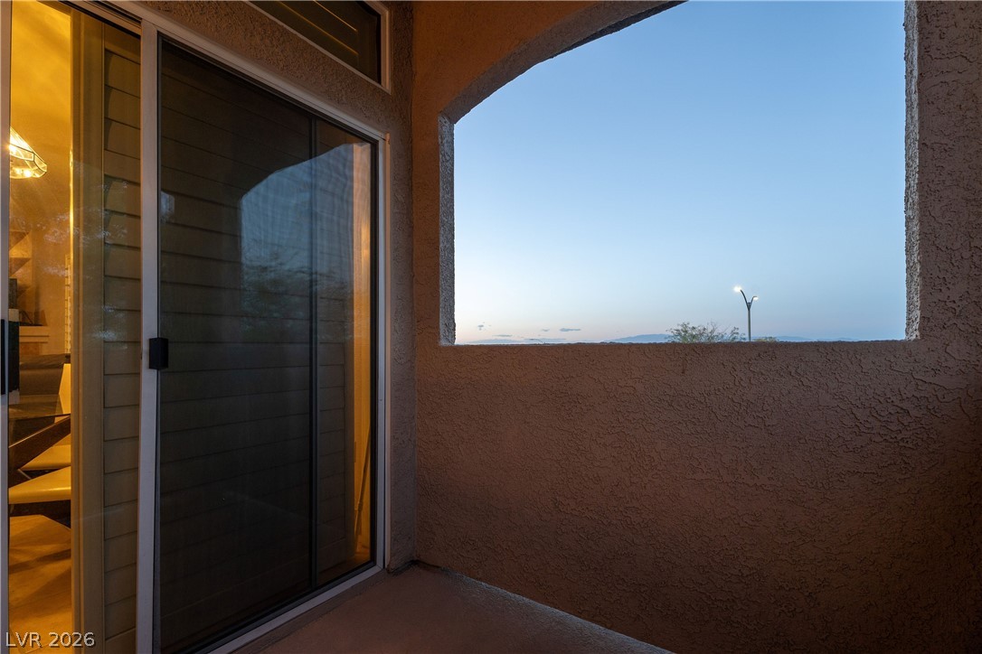2305 West Horizon Ridge Parkway, Unit 224 Henderson, NV 89052 - Photo 5 of 41 This outdoor patio offers a serene vista, perfect for tranquil moments under an open sky.