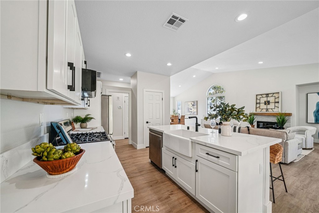 12842 Tilden Drive Rancho Cucamonga, CA 91739 - Photo 18 of 71 a large white kitchen with lots of counter top space