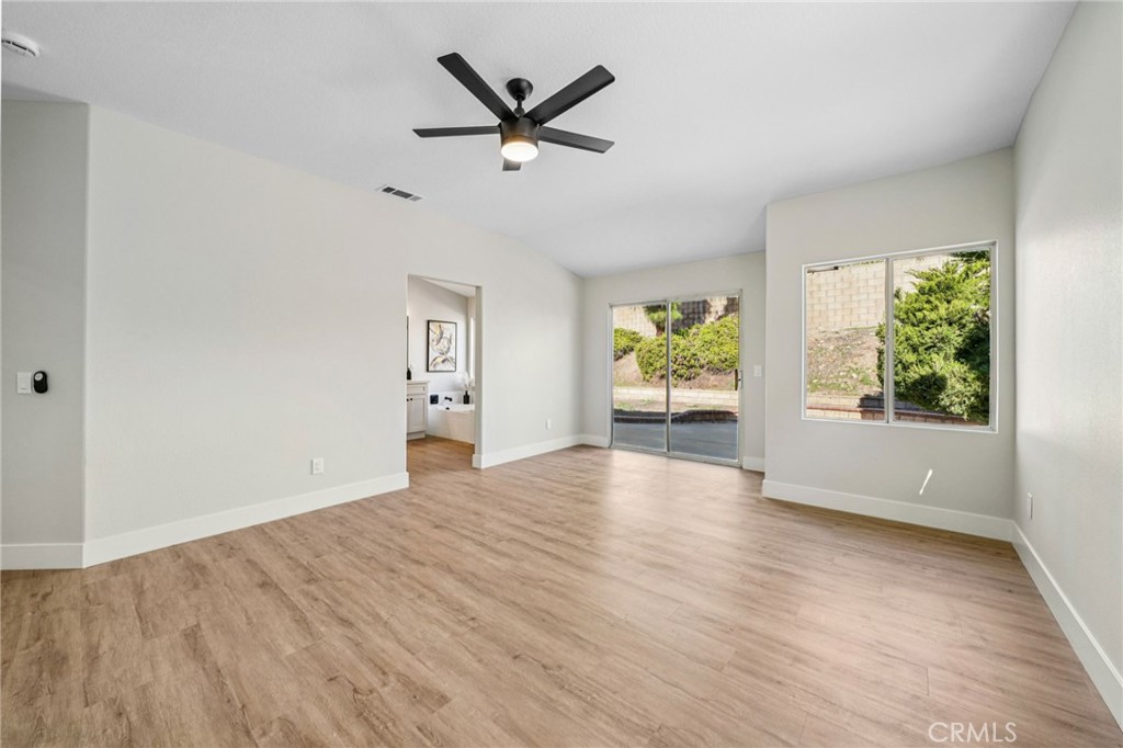 12842 Tilden Drive Rancho Cucamonga, CA 91739 - Photo 26 of 71 wooden floor in an empty room with a window