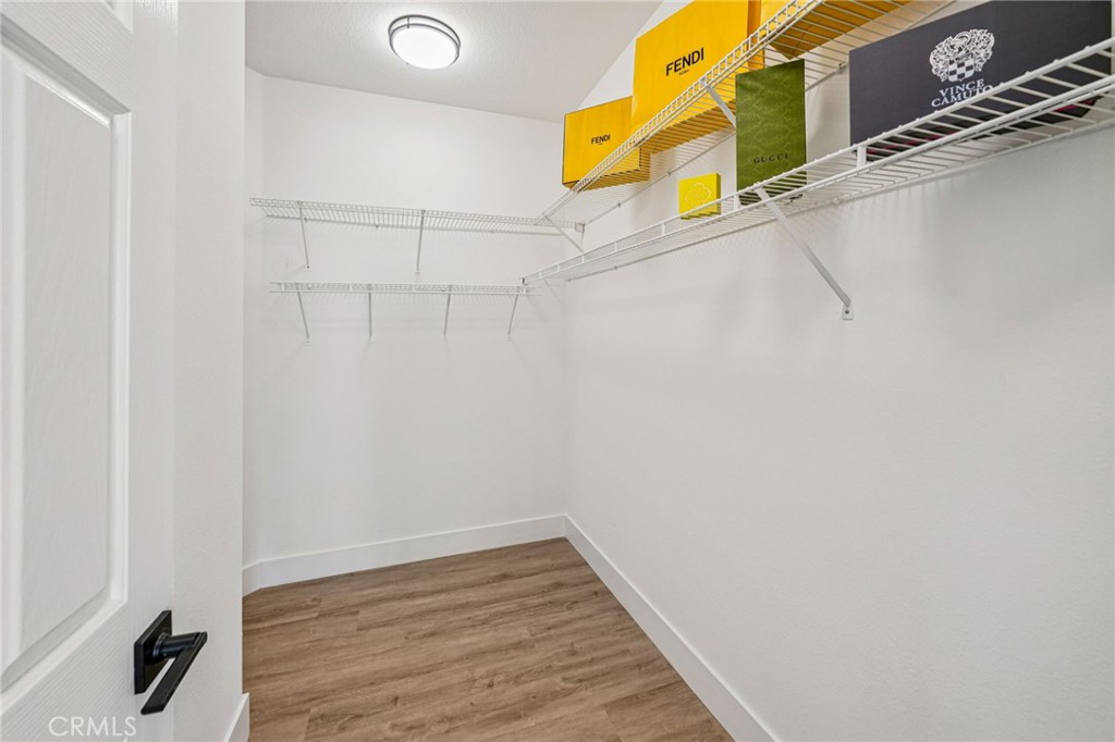 12842 Tilden Drive Rancho Cucamonga, CA 91739 - Photo 35 of 71 a bathroom with a sink and mirror