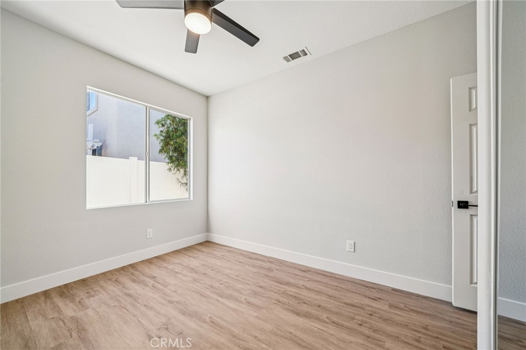 12842 Tilden Drive Rancho Cucamonga, CA 91739 - Photo 42 of 71 wooden floor in an empty room with a window